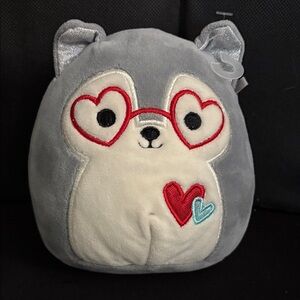 Gray and White Stuffed Animal with Heart Glasses